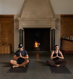 two people meditating 