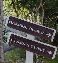 Massage village sign