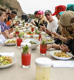 group eating on beach