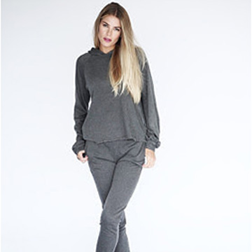 A woman in gray athleisure outfit