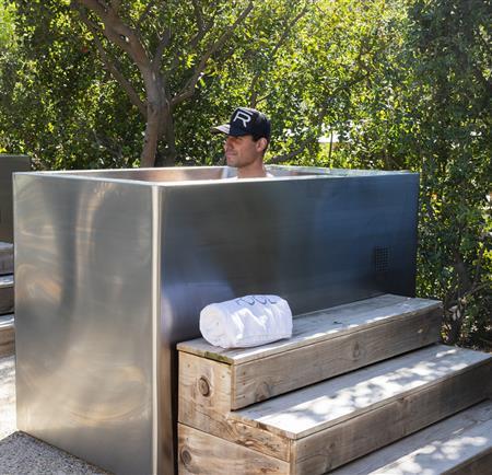 man entering plunge pool