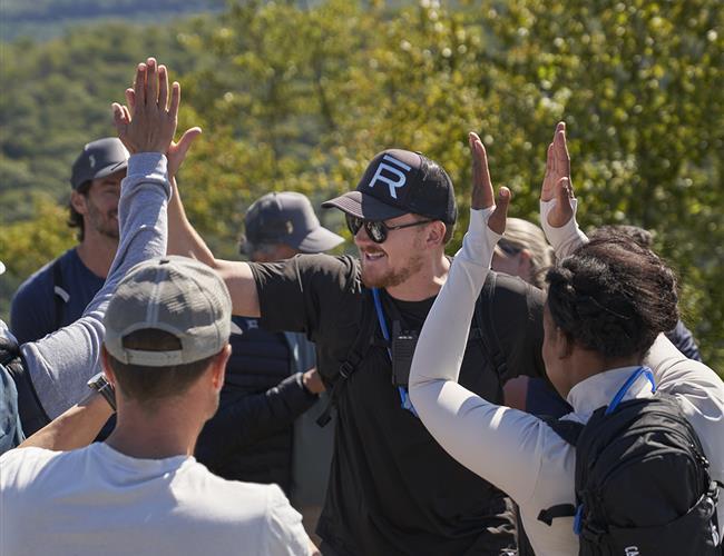 A group enjoying a high 5