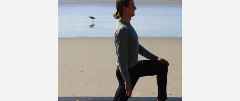 on the mat beach yoga pose